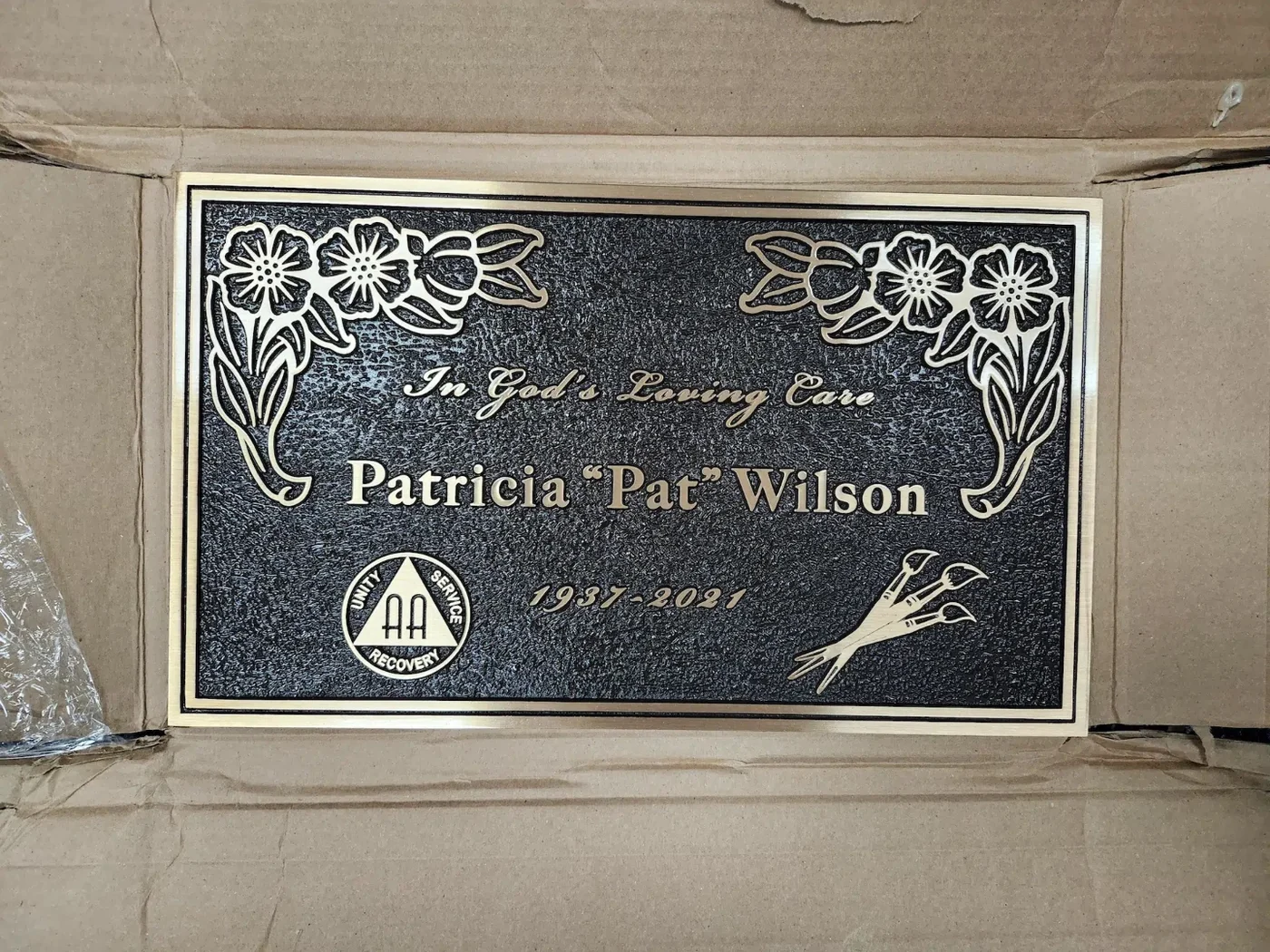 Bronze grave marker — featured cast